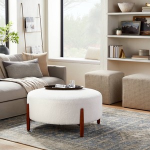 Elroy Faux Shearling Round Cocktail Ottoman with Wood Legs Cream - Threshold™ designed with Studio McGee - 1 of 4