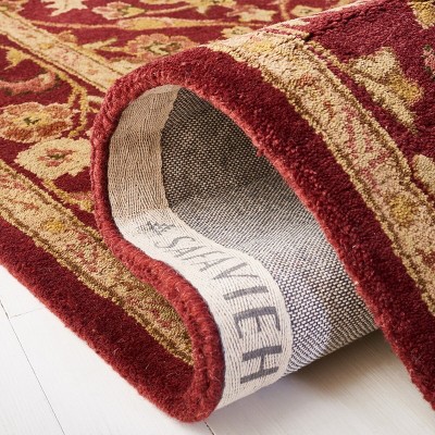 Handmade Wine and Gold Tufted Wool Area Rug