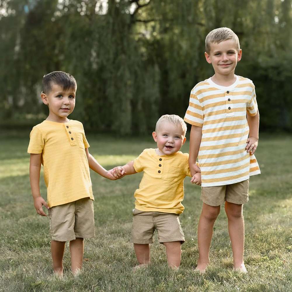 user image by @_b_fit_1_, Boys' Short Sleeve Striped Henley Shirt - Cat & Jack™