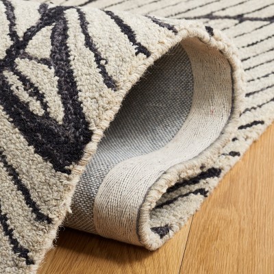 Hand-Tufted Black and Ivory Wool Floral Area Rug