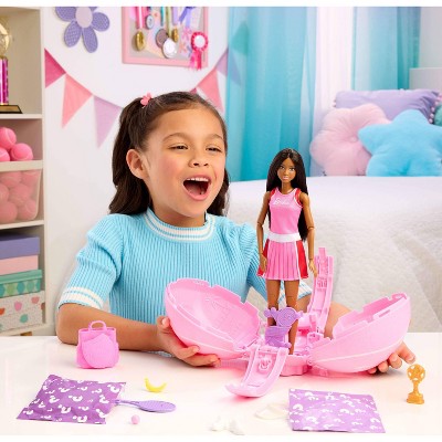 Condition photo showing New/Like New for barbie team barbie roll and reveal tennis player doll and accessories with brunette fashion doll 8 surprises and tennis ball encasement