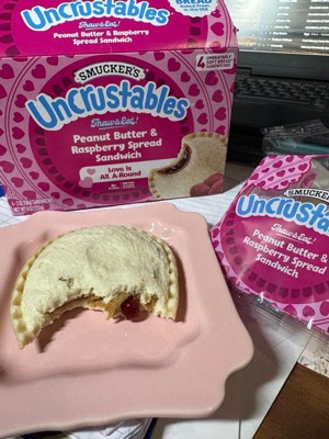 Smucker's Uncrustables Frozen Peanut Butter & Raspberry Spread Sandwich ...