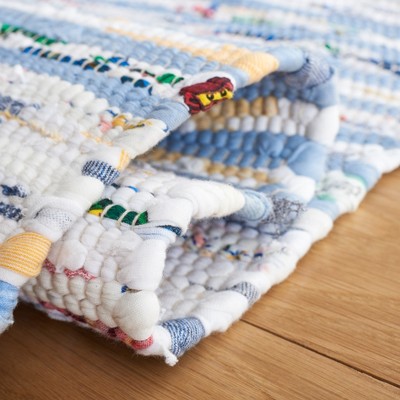 Ivory and Blue Hand Tufted Floral Wool Rug