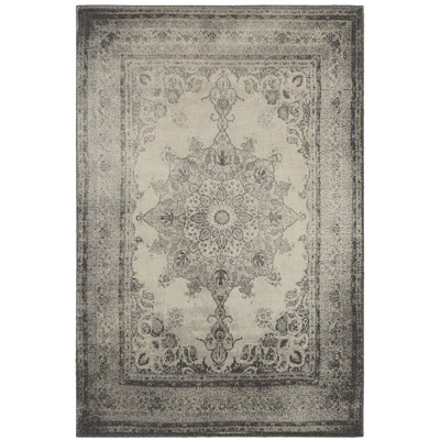 Ivory Rectangular Stain-Resistant Synthetic Area Rug, 6'7" x 9'6"
