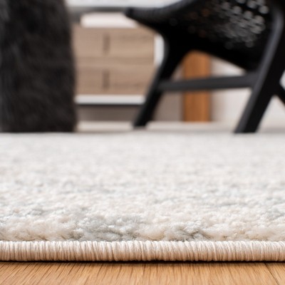 104" Round Ivory/Light Grey Geometric Synthetic Area Rug