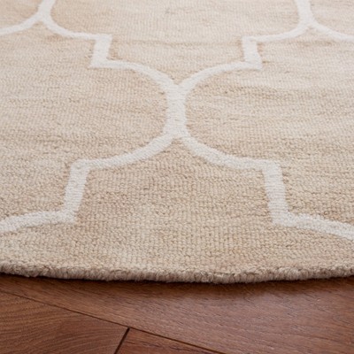 Ivory Elegance 7' Round Hand-tufted Wool Area Rug