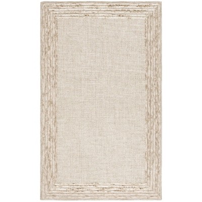 Ebony EBN425 Handmade Tufted Rug - Safavieh