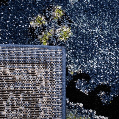 Vintage Blue and Black Synthetic Area Rug 8' x 10'