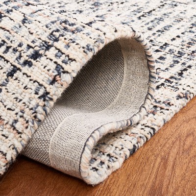 Handmade Black and Beige Abstract Wool Area Rug, 4' x 6'