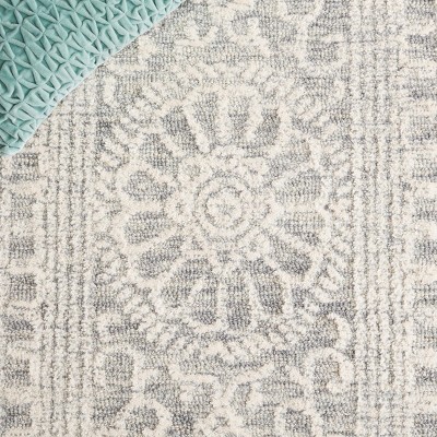 Ivory and Grey Hand Tufted Wool 4' x 6' Area Rug
