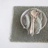Storied Home Woven Cotton Blend Placemat with Metallic Thread, and Fringe, Olive Green - 3 of 4
