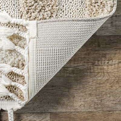 Cordelia Ivory Synthetic 5' x 7'6" Easy-Care Area Rug