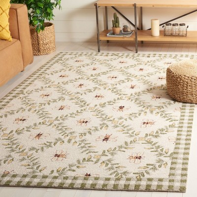 Handmade Ivory and Green Floral Wool Area Rug