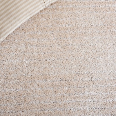 Beige 8' x 10' Round Shag Synthetic Area Rug