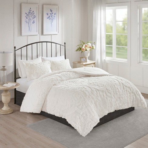 white comforter king bed