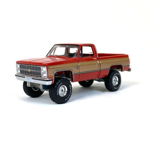 Auto World 1/64 1983 Chevy K10 4x4, Red/Gold, Exclusive Limited Edition  CP7805