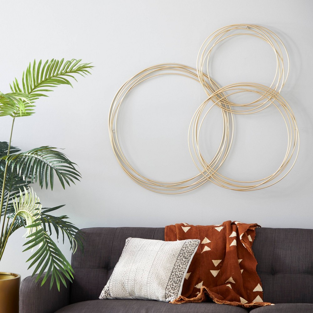 Photos - Wallpaper Metal Plate Overlapping Ring Wall Decor Gold - CosmoLiving by Cosmopolitan