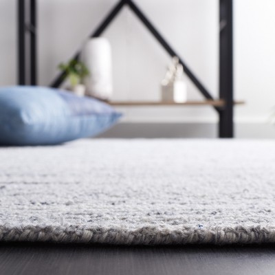 Mirage Blue and Ivory Hand Tufted 4' x 6' Viscose Rug
