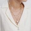HTUTWOO Boho 5 Tier Gold Punk Chain Layered Necklace Dainty Pearls Pearls Pendant Long Choker Necklaces for Women - 2 of 4