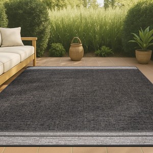 Alda Modern Minimalist Mingled Solid Indoor/Outdoor Area Rug - JONATHAN Y - 1 of 4