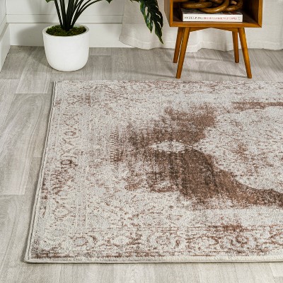 Ivory and Brown Medallion Synthetic 8' x 10' Area Rug