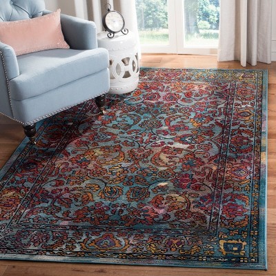 Light Blue and Orange Synthetic Rectangular 4' x 6' Area Rug