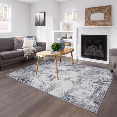 Ivory and Gray Abstract Synthetic Area Rug 4' x 5'
