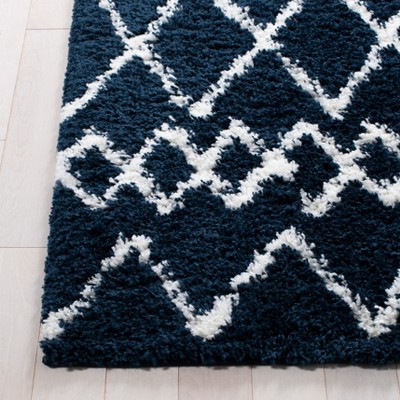 Ivory and Navy 8' x 10' Synthetic Shag Area Rug