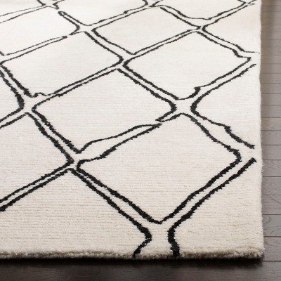 Ivory and Black Hand-Tufted Wool Shag Area Rug 4' x 6'