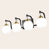 PAKOKULA 4-Light Black and Gold Vanity Light with Globe White Frosted Glass Shade - 3 of 4