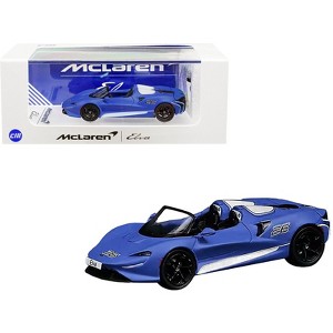 McLaren Elva Convertible #26 Matt Blue with White Stripes and Extra Wheels 1/64 Diecast Model Car by CM Models - 1 of 4
