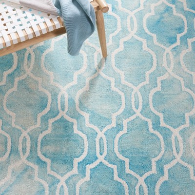 Turquoise and Ivory Hand-Tufted Wool Area Rug 4' x 6'