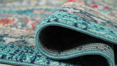 3' x 5' Pink and Ivory Synthetic Medallion Area Rug