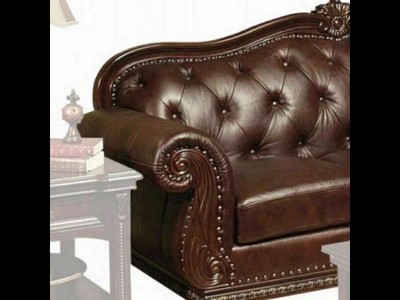 Brown Tufted Faux Leather Sofa with Rolled Arms and Nailhead Trim