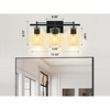 DAKAFUL Modern Bathroom Vanity Light, Vanity Fixture Over Mirror with Black Frame&Clear Glass Shade, Wall Light for Mirror, Bedroom, Bathtub Area - 3 of 4