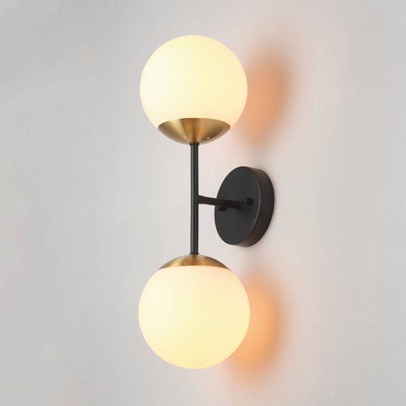 Celestia 2-Light Matte Black Wall Sconce with Antique Brass Accent Socket and Matte Opal Glass Shades - Globe Electric, 6 of 11