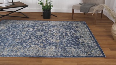 Ivory and Blue Oriental Synthetic 8' x 10' Area Rug