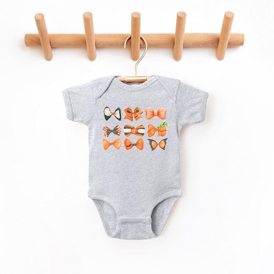 The Juniper Shop Coquette Girl Halloween Bow Chart Baby Bodysuit