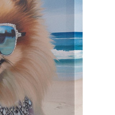 Playful Pomeranian Beach Day Canvas Wall Art in Multicolor