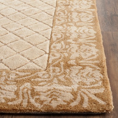 Ivory and Cream Hand-Hooked Wool 8' x 10' Area Rug