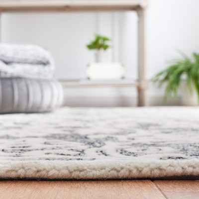 Handcrafted Elegance 8' x 10' Black Wool Tufted Area Rug
