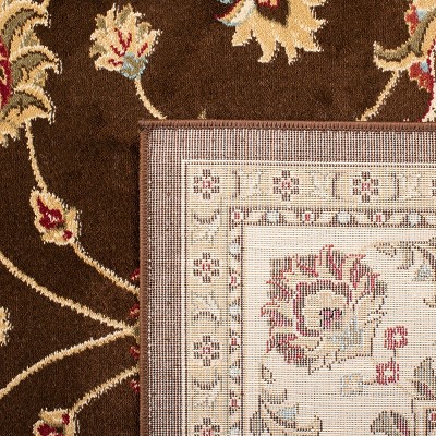Brown and Ivory 4' x 6' Hand-Knotted Synthetic Area Rug