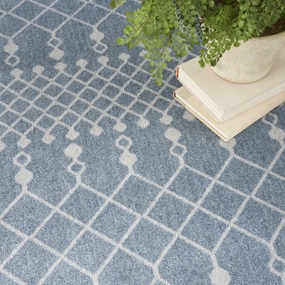 Astra Blue and Ivory Synthetic 4' x 6' Trellis Area Rug