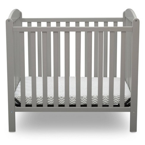 Grey store mini crib