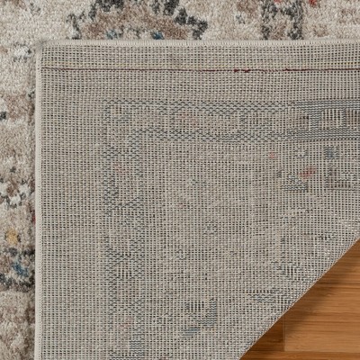 Ivory Tufted Rectangular 8' x 10' Synthetic Area Rug