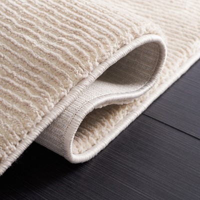 Elegant Beige Synthetic 31'' Rectangular Easy-Care Area Rug