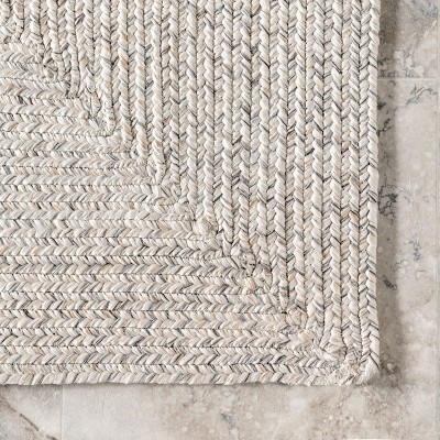Handmade Ivory Braided 4' x 6' Oval Synthetic Area Rug