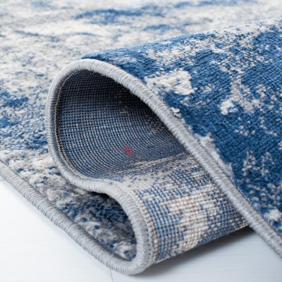 Grey and Navy Abstract 8' x 10' Synthetic Area Rug