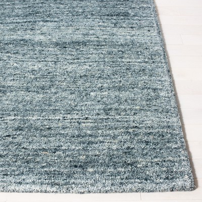 Hand-Tufted Artisan Blue Wool Rug 4' x 6'