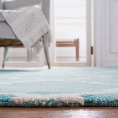 Handmade Ivory Wool Rectangular Tufted Area Rug - 3' x 5'